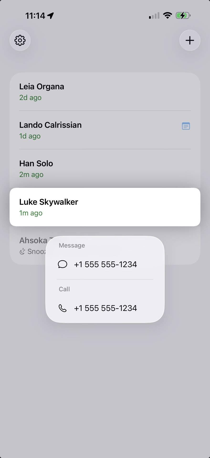 Long-press context menu showing Message and Call options with phone numbers